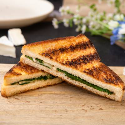 Goat brie, caramelized onions, spinach and cashew butter grilled cheese 