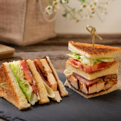 Chicken, bacon, cheese and lettuce club sandwich 