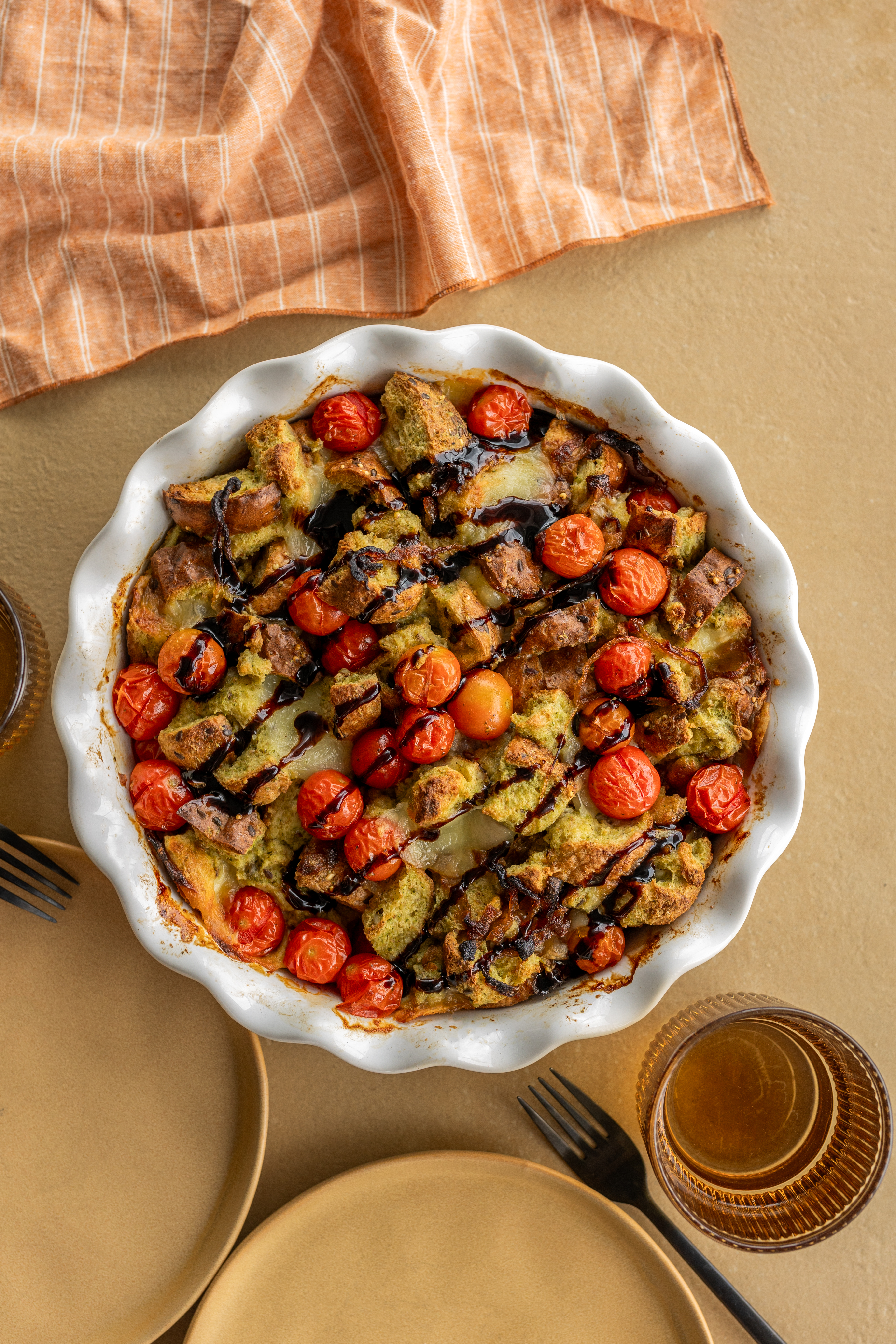 French toast casserole with Tomatoes, Pesto, Bocconcini, and Balsamic Sauce